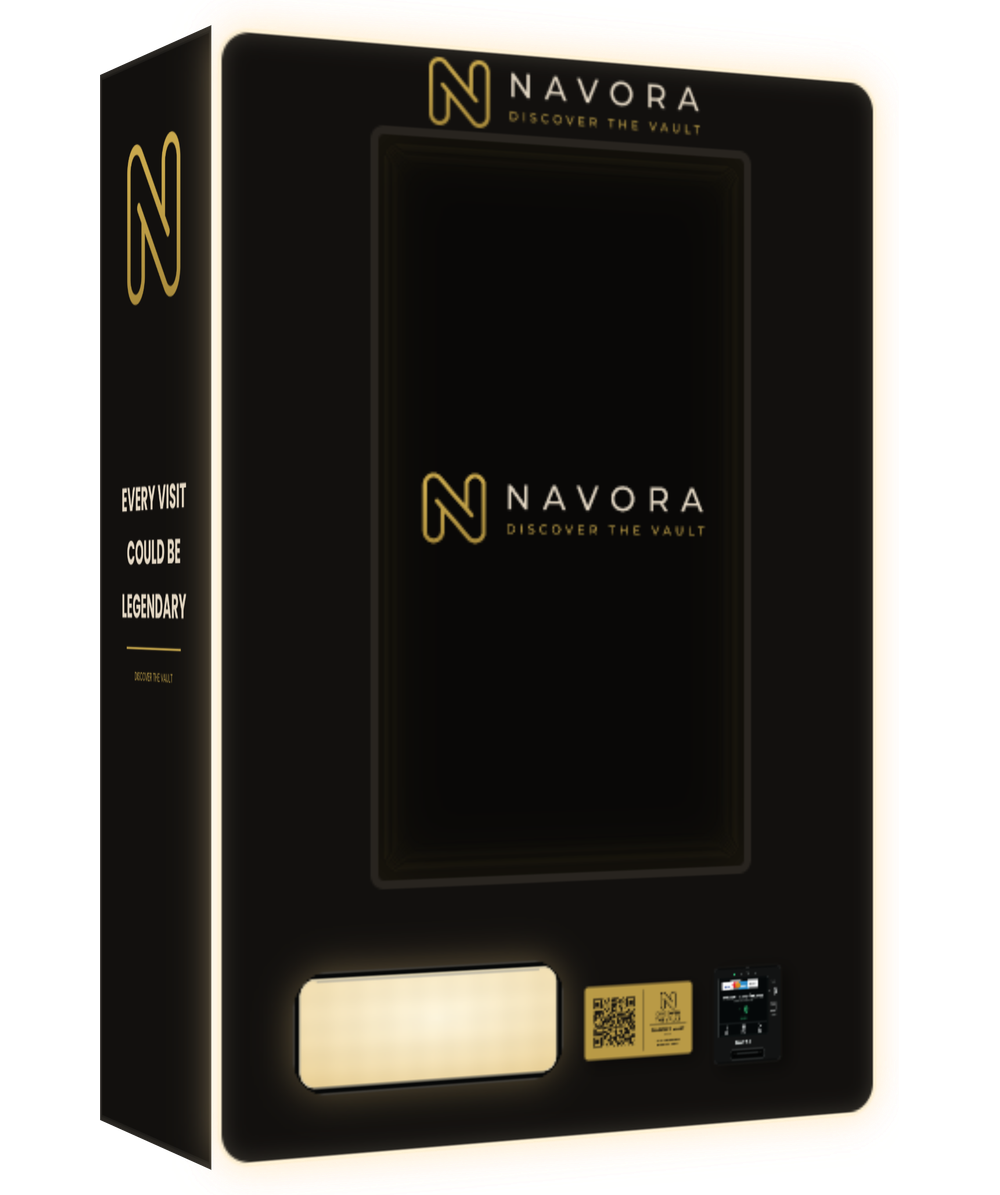 Navora Founder’s Vault, three-quarter front-left view of the wall-mounted matte-black cabinet, showing the branded left side panel, the 32-inch portrait display, the warm-white backlit retrieval opening at the lower left, and the brushed-gold Founder’s Vault QR plaque directly left of the black Nayax reader